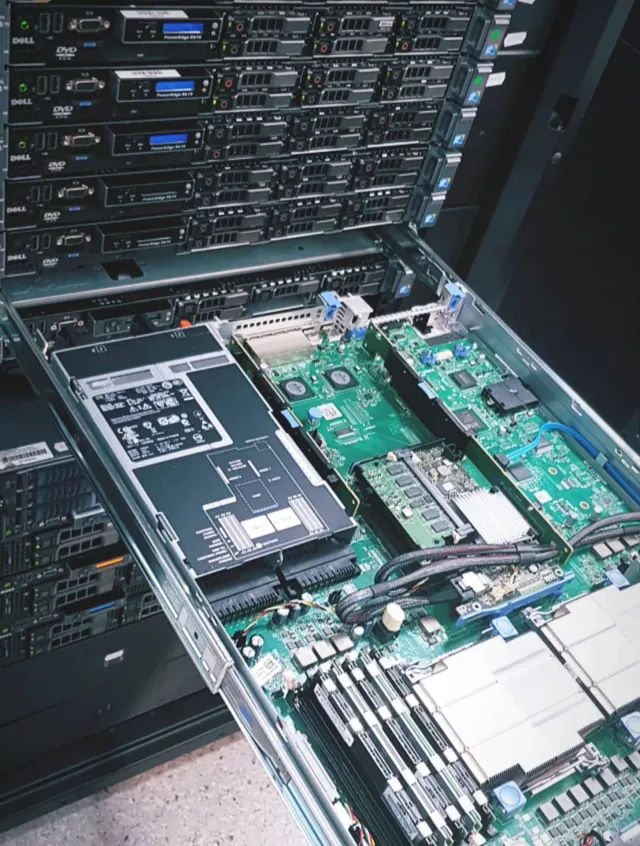 Dell PowerEdge pulled out on rails, mainboard exposed