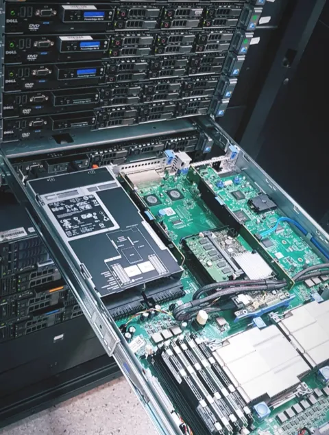 Dell PowerEdge pulled out on rails, mainboard exposed