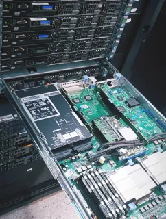 Dell PowerEdge pulled out on rails, mainboard exposed